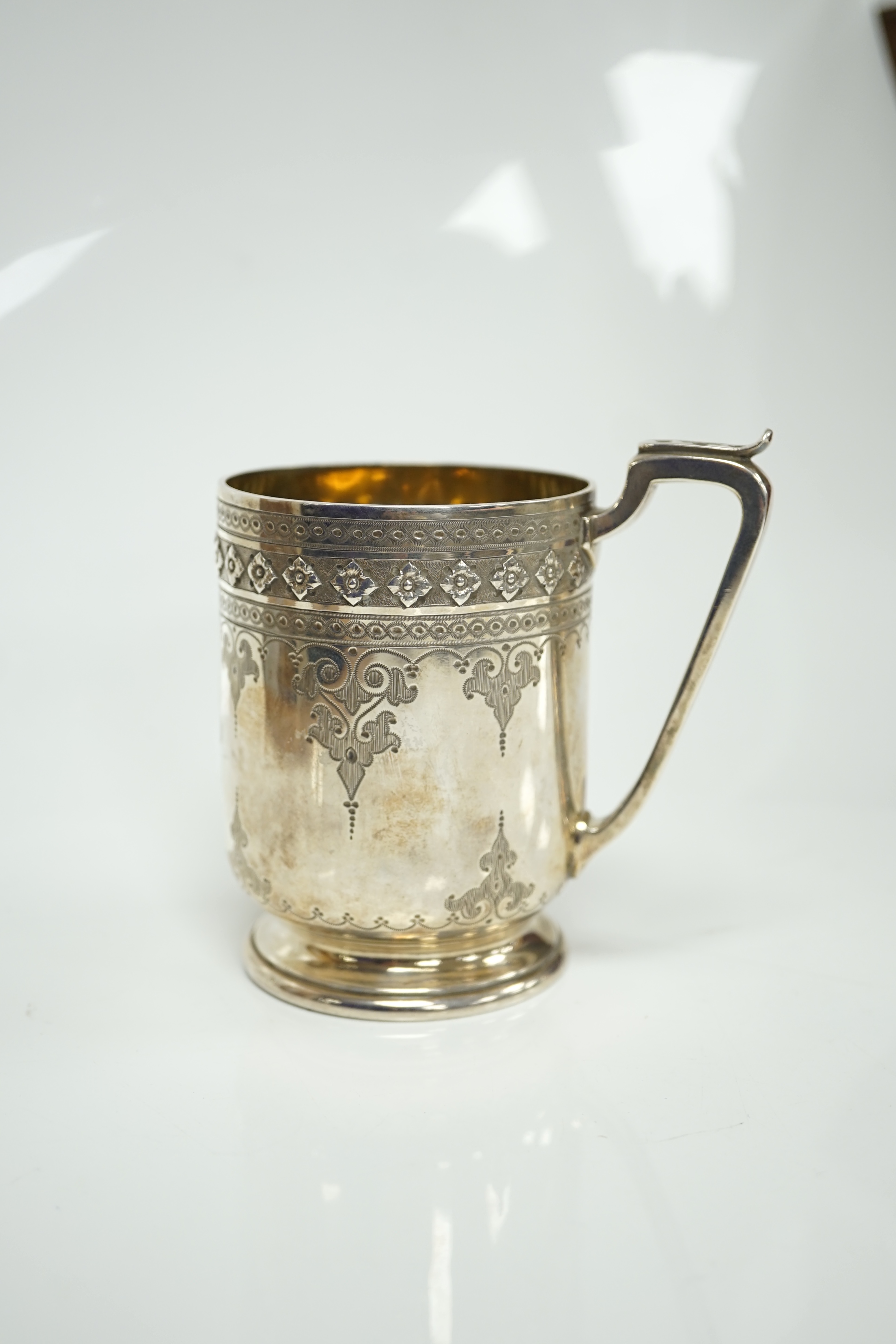 A Victorian engraved silver christening mug, Edward & John Barnard, London, 1857, 10cm, 5.7oz. Condition - fair